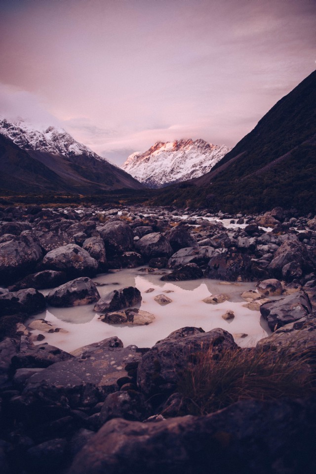 Beautiful snow covered mountains are ahead but we need to cross a big puddle full of sharp stones to get there.